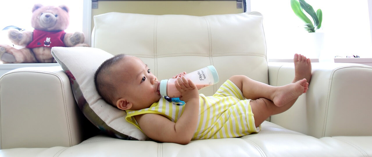 Kid chilling and drinking