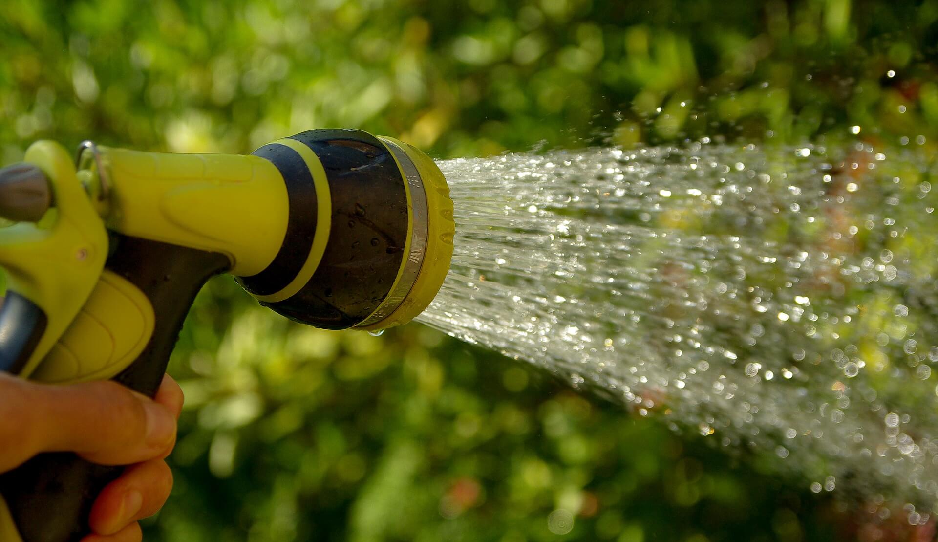 Hose with sprinkler system